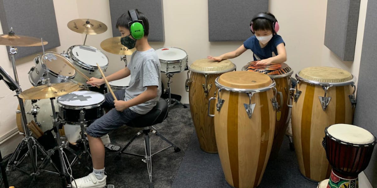 Groove Music School Kids Learning Drums